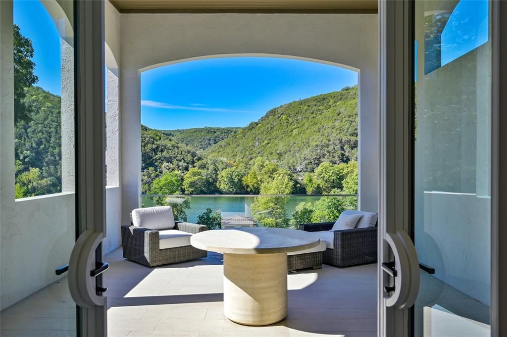 Modern luxury on lake austin remarkable home in prestigious enclave asks for 12. 75 million 31