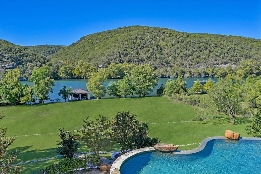 Modern luxury on lake austin remarkable home in prestigious enclave asks for 12. 75 million 33