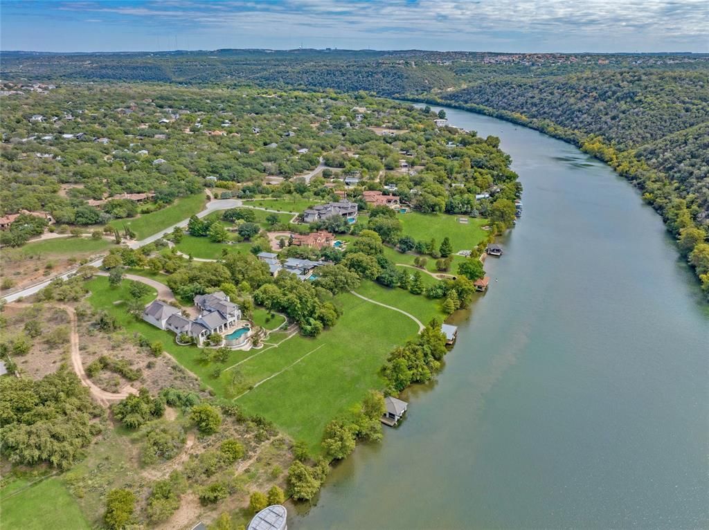 Modern luxury on lake austin remarkable home in prestigious enclave asks for 12. 75 million 39