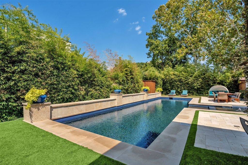 Preston hollow elegance modern mediterranean home with open layout and entertaining amenities for sale at 3. 15 million 13