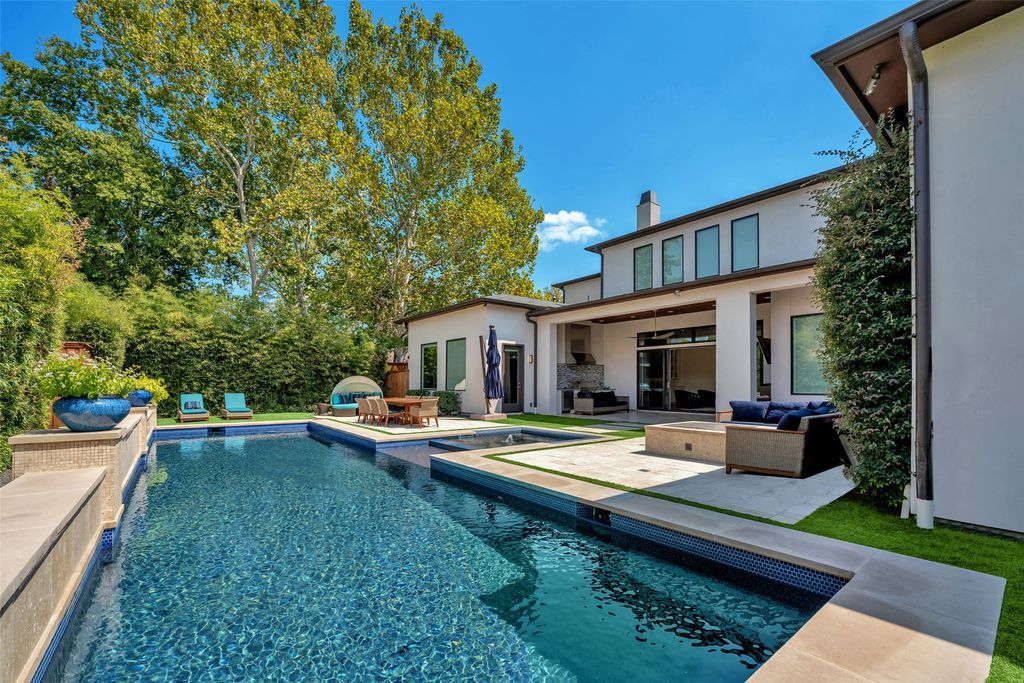 Preston hollow elegance modern mediterranean home with open layout and entertaining amenities for sale at 3. 15 million 14