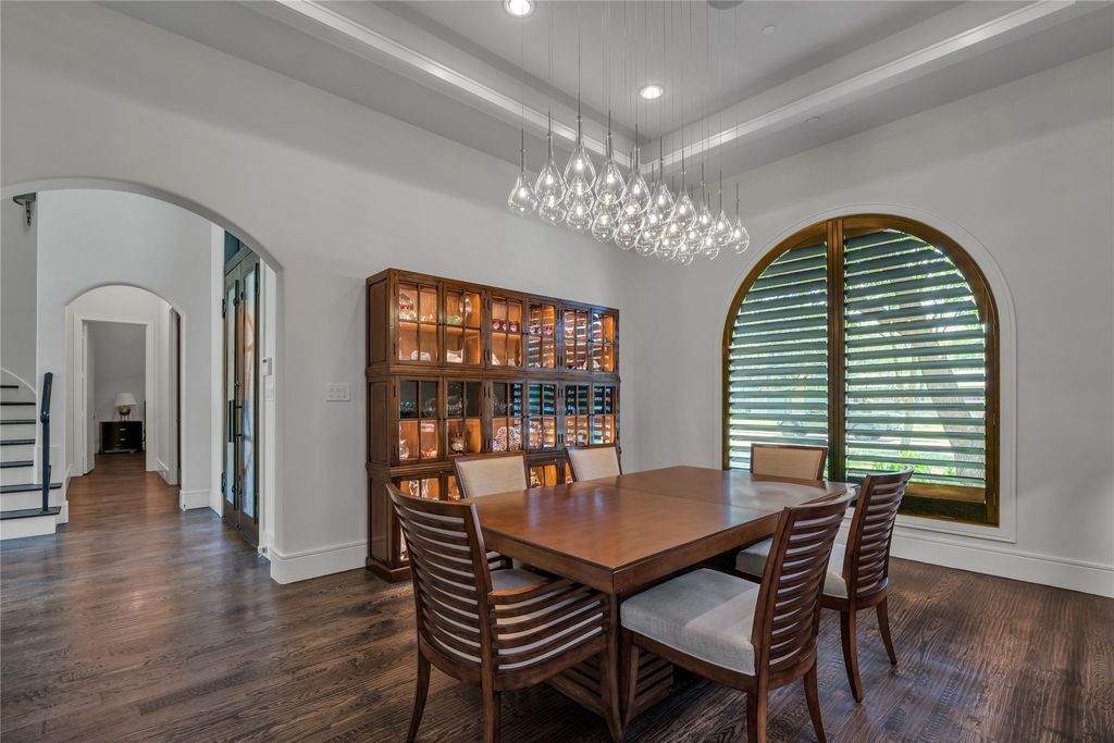 Preston hollow elegance modern mediterranean home with open layout and entertaining amenities for sale at 3. 15 million 26