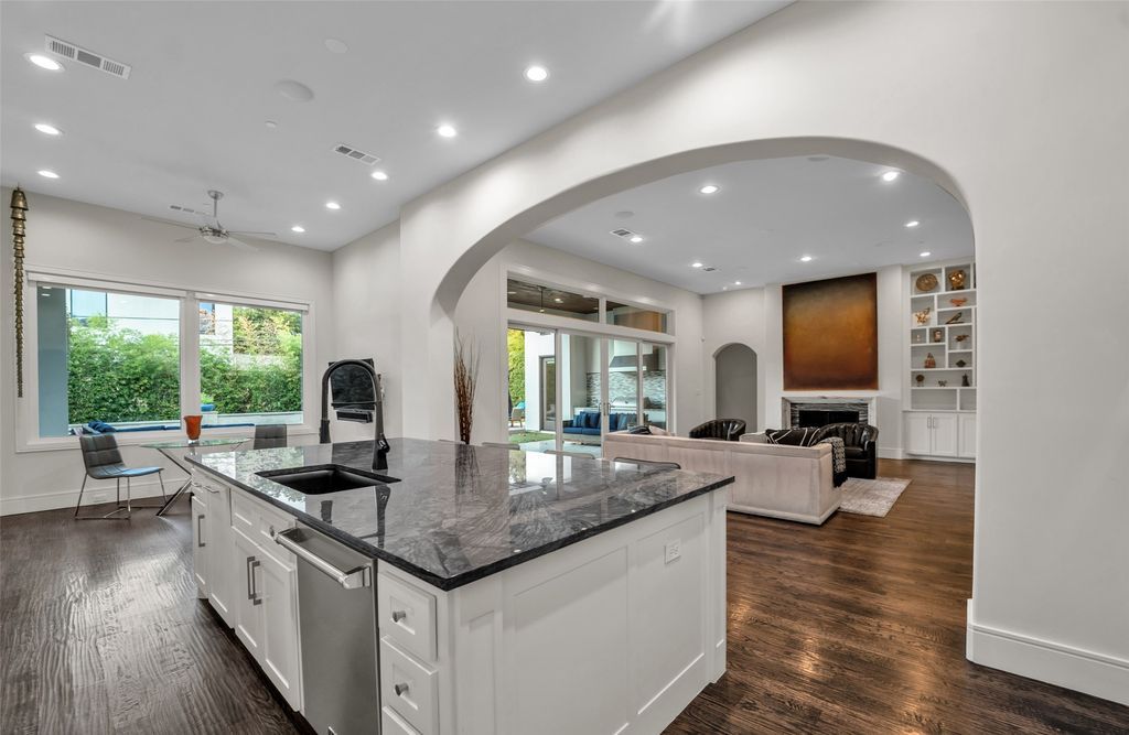 Preston hollow elegance modern mediterranean home with open layout and entertaining amenities for sale at 3. 15 million 6