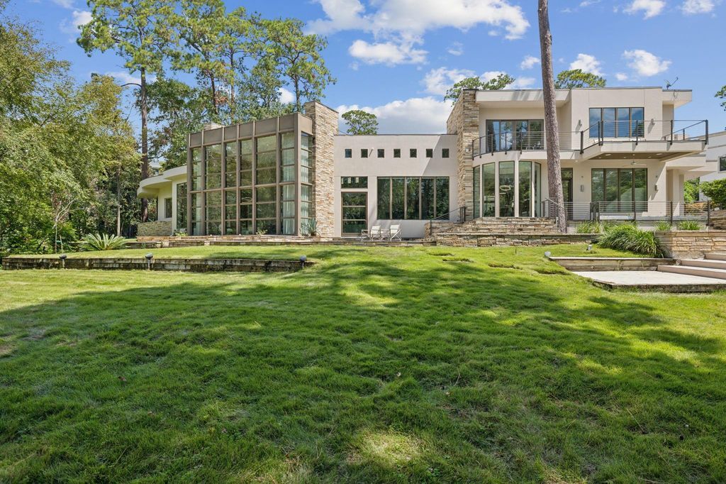 Sprawling contemporary estate offering serenity and proximity to the city listed for 5. 99 million 42