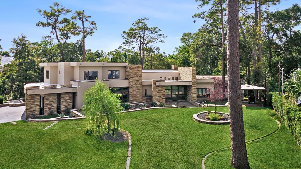 Sprawling contemporary estate offering serenity and proximity to the city listed for 5. 99 million 48