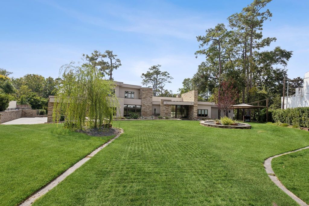 Sprawling contemporary estate offering serenity and proximity to the city listed for 5. 99 million 49