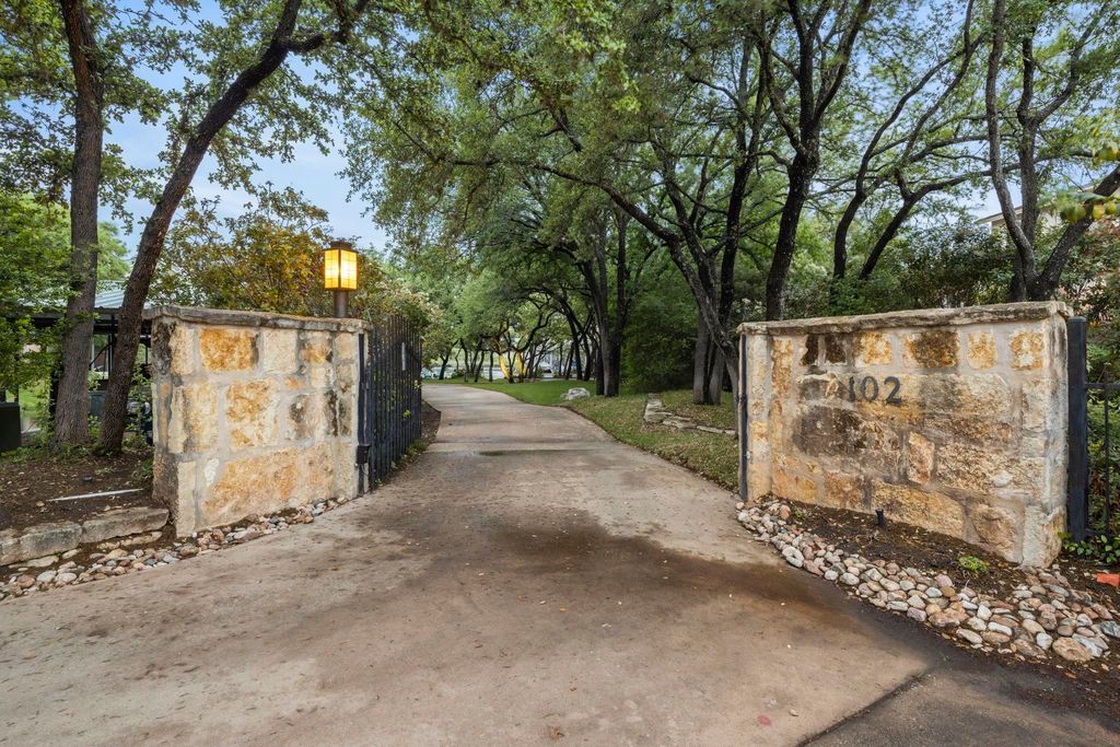 Stunning estate with 384 of water frontage gated entry and tree lined drive for sale at 3599000 4