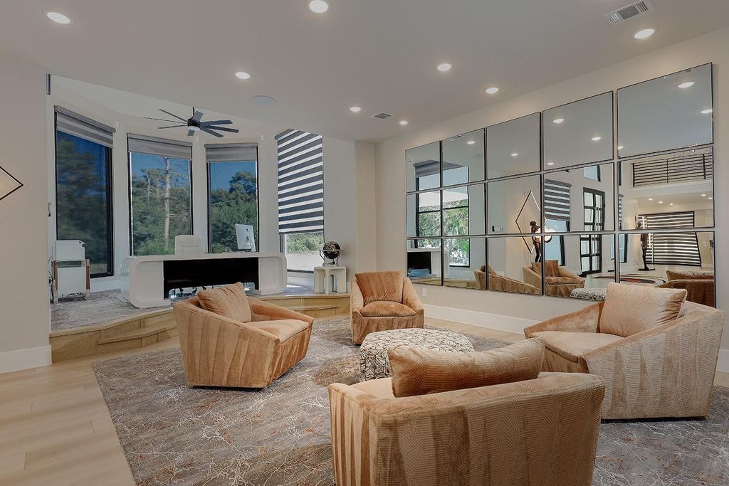 Contemporary luxury redefined this stunning residence with east and west wings is listed for 4 6