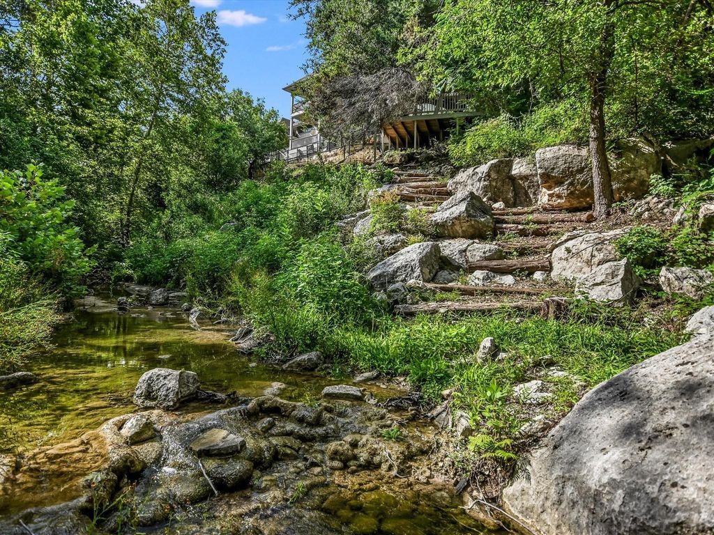 Exquisite home with scenic creek and canyon views offering ultimate privacy listed for 2295000 31