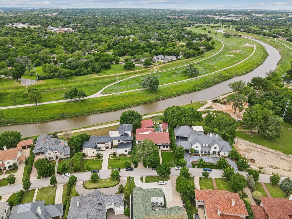 Exquisite spanish hacienda overlooking the trinity river quality construction and luxurious amenities for 4. 85 million 39