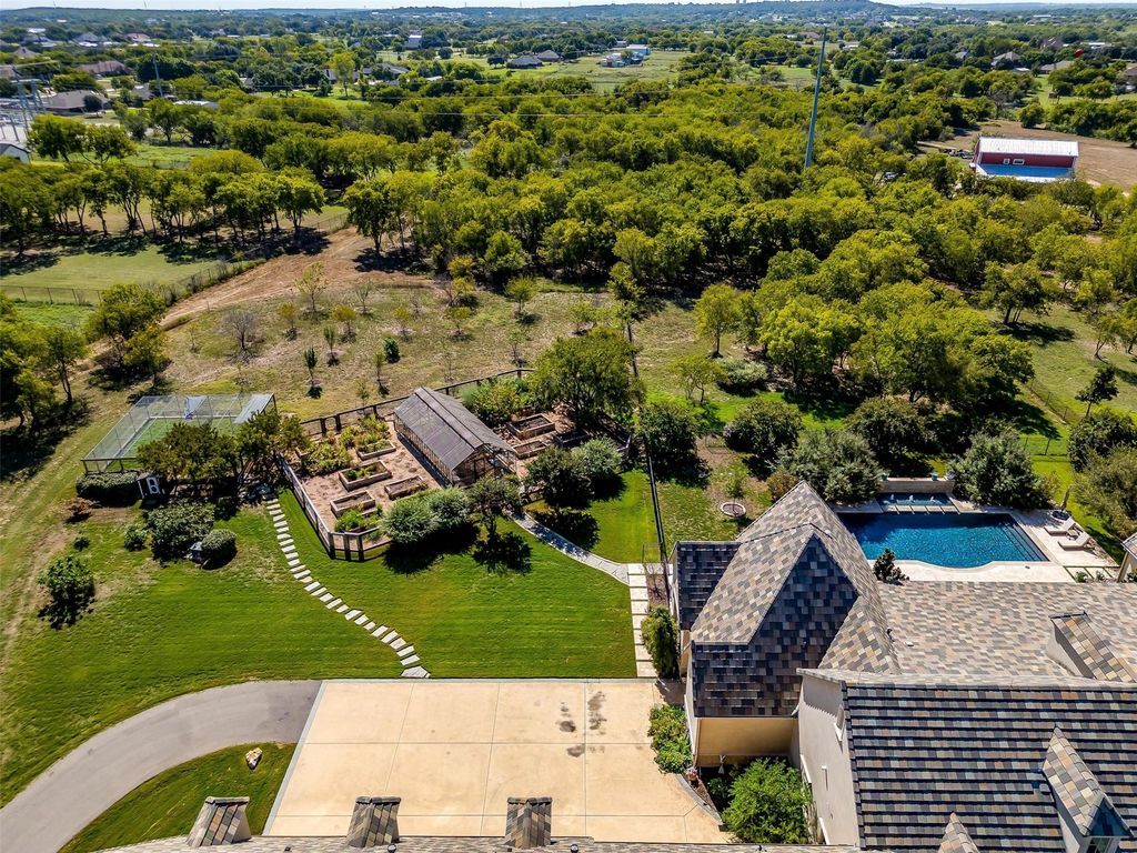 Magnificent 63 acre estate with well manicured grounds and stocked pond listed for 10. 1 million 34