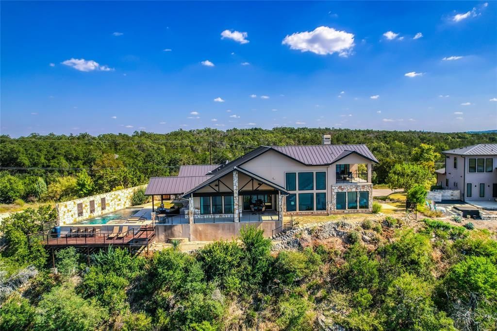 Panoramic lake views await in this elegant executive home now on the market for 2. 2 million 35