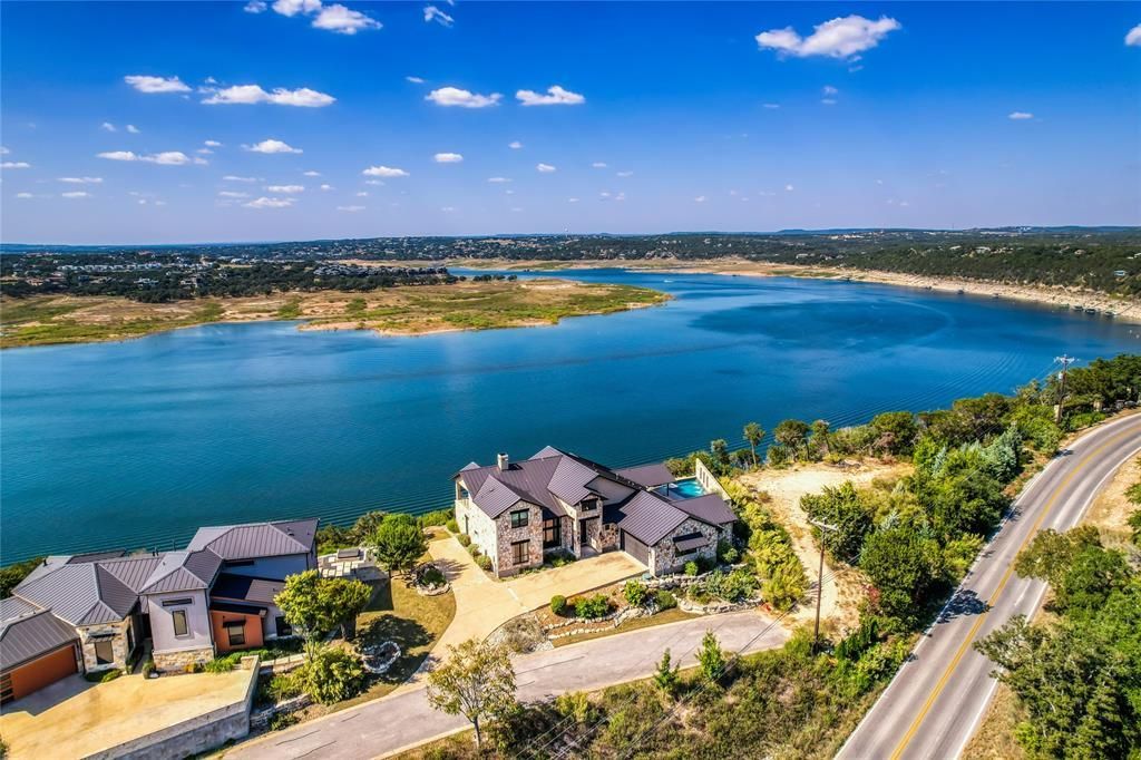 Panoramic lake views await in this elegant executive home now on the market for 2. 2 million 36