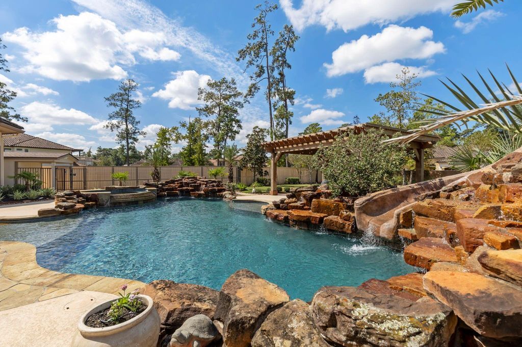 Stunning custom home in augusta pines with luxury features and backyard oasis listed for 2. 6 million 33