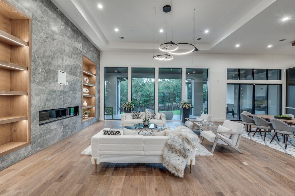 Stunning modern luxury retreat on 1. 45 acre treed lot in hill country available for 4. 89 million 6