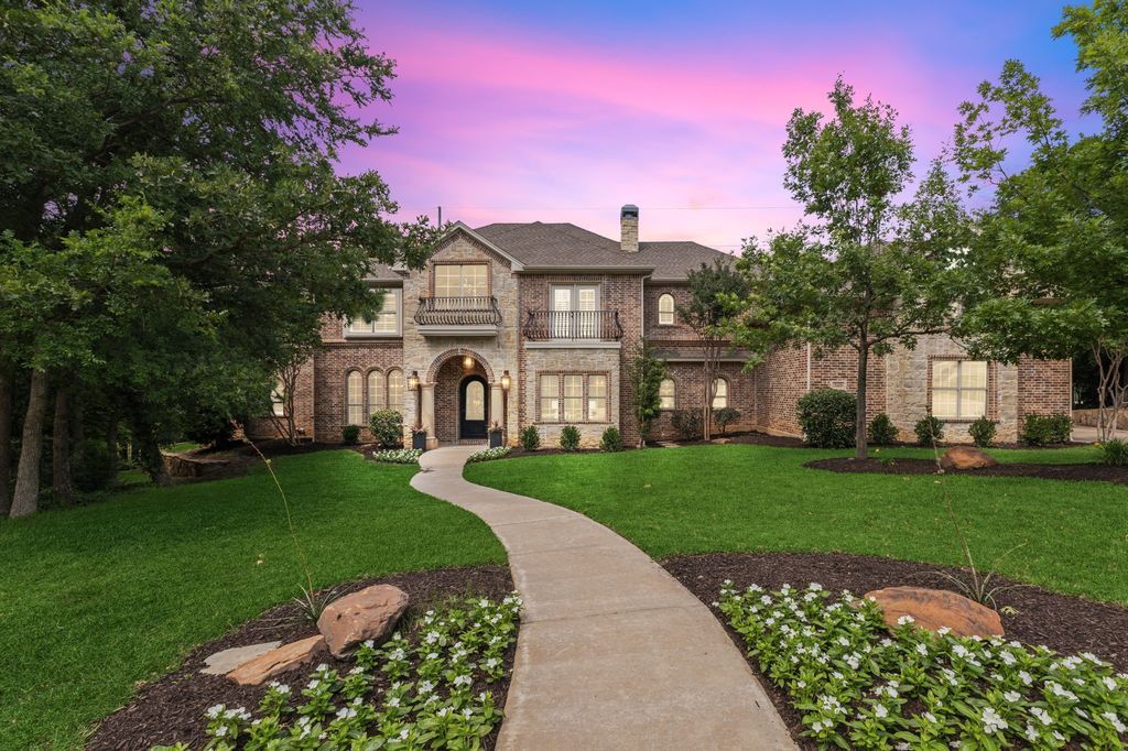 Embrace elevated living in a custom built masterpiece amid majestic oaks – now available for 2299999 1