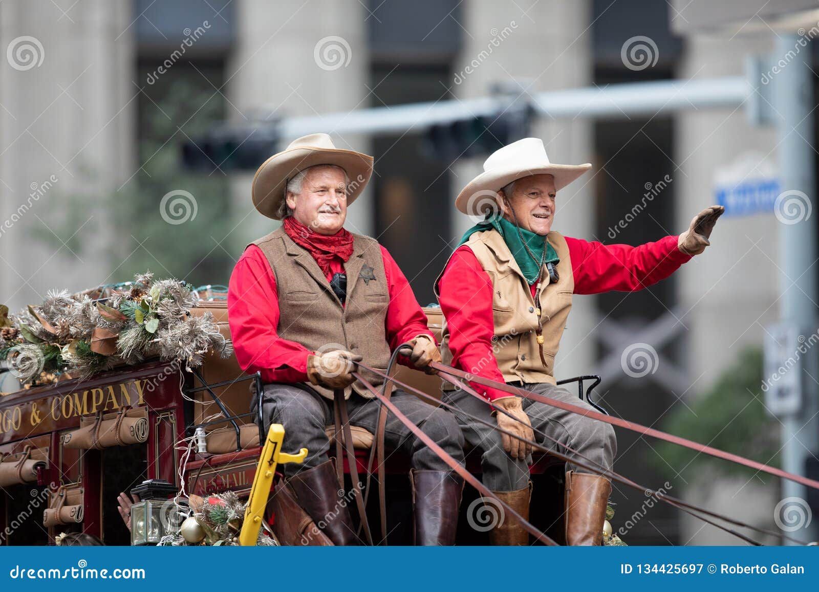 Houston texas usa november h e b thanksgiving day parade men dress up as cowboys riding wells fargo wagon parade 134425697 result