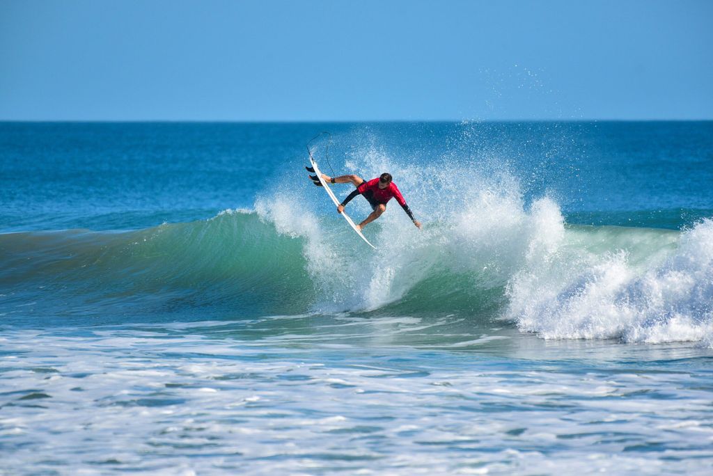 Surfing on cocao beach courtesy of visitspacecoast. Com scaled compressed result