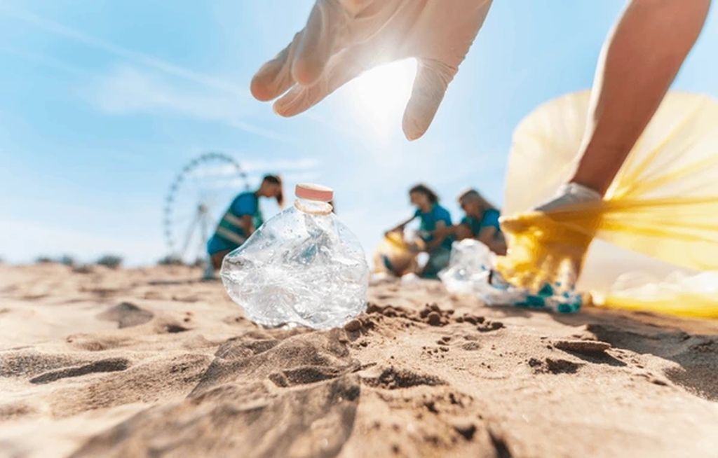 Group eco volunteers picking plastic 600nw 2161479431 result