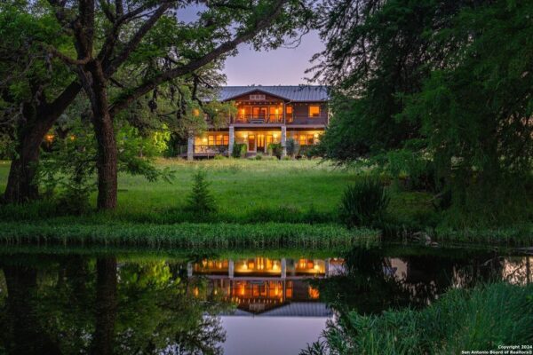 Charming Two-Story Rock Home with River and Bluff Views for $2,245,500