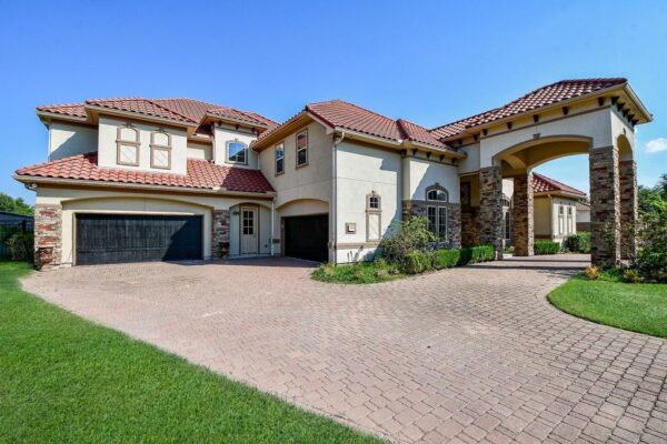 Mediterranean Elegance: Waterfront Estate in Exclusive Riverstone Community for $3 Million